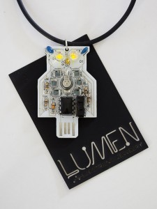 Blinking White Retro Owl Necklace on a laser-cut mounting card